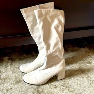 White go go boots.  Used once for Princess Leia costume at Halloween.